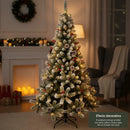Pinheiro artificial premium com neve, pinhas e frutos vermelhos.