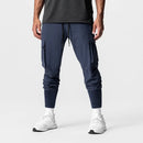Calça desportiva camuflada para homem – leve, elástica e de secagem rápida.
