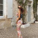 Vestido midi floral de alças finas e racha lateral – Verão 2025