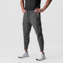 Calça desportiva camuflada para homem – leve, elástica e de secagem rápida.