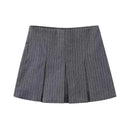Saia-calções plissada de cintura subida – Estilo casual e versátil para o verão.