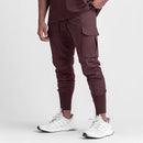 Calça desportiva camuflada para homem – leve, elástica e de secagem rápida.