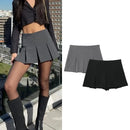 Saia-calções plissada de cintura subida – Estilo casual e versátil para o verão.